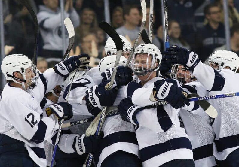 Penn State hockey players celebrating