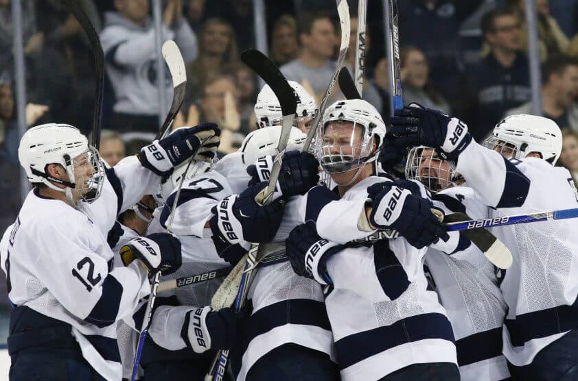 Penn State hockey players celebrating